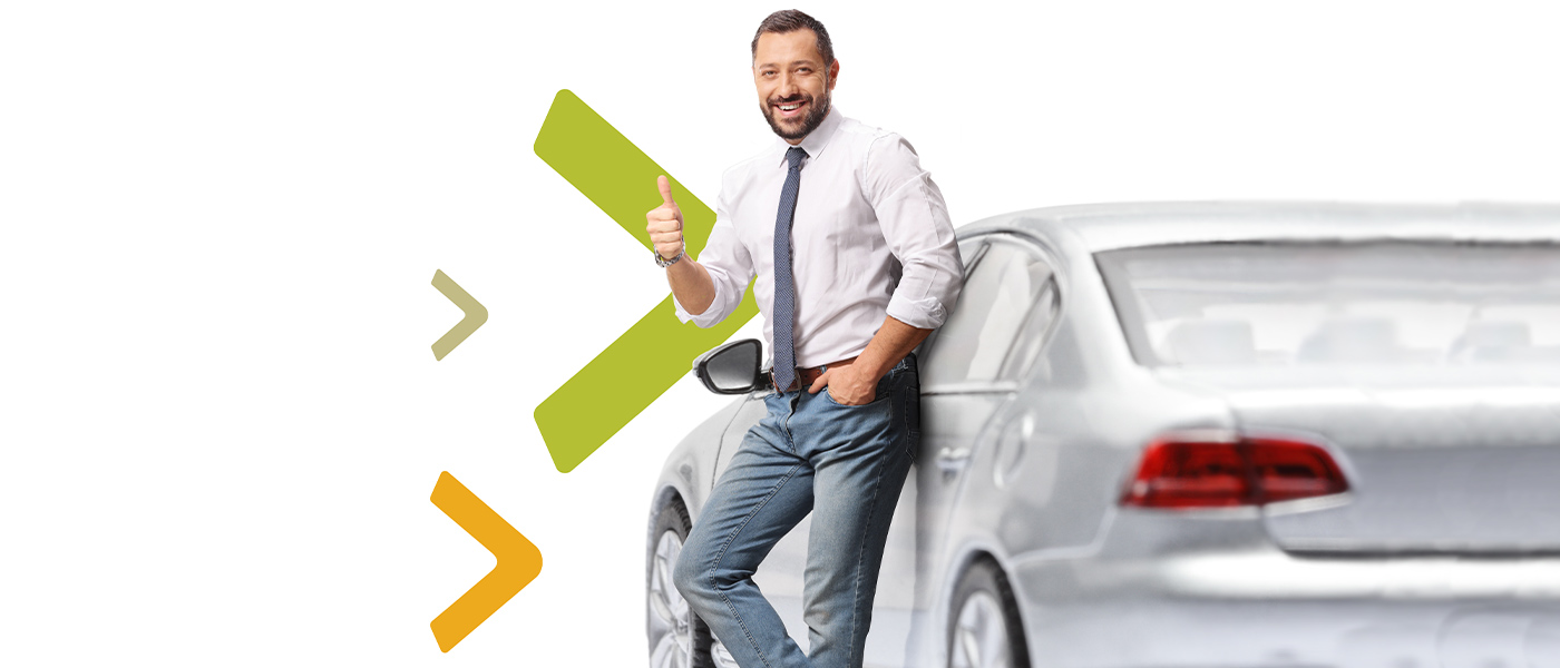 Man standing next to a car