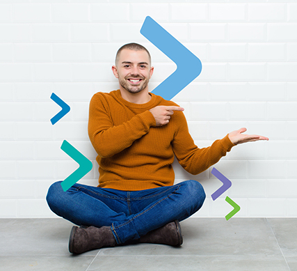 Man sitting on floor pointing