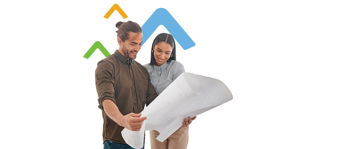 couple looking at plans to renovate house