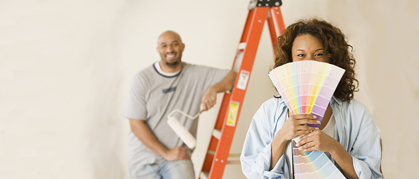 Woman holding paint samples