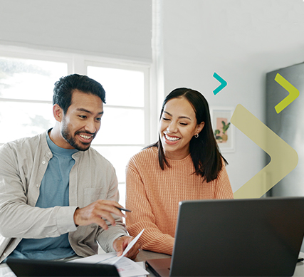 Couple sitting at computer