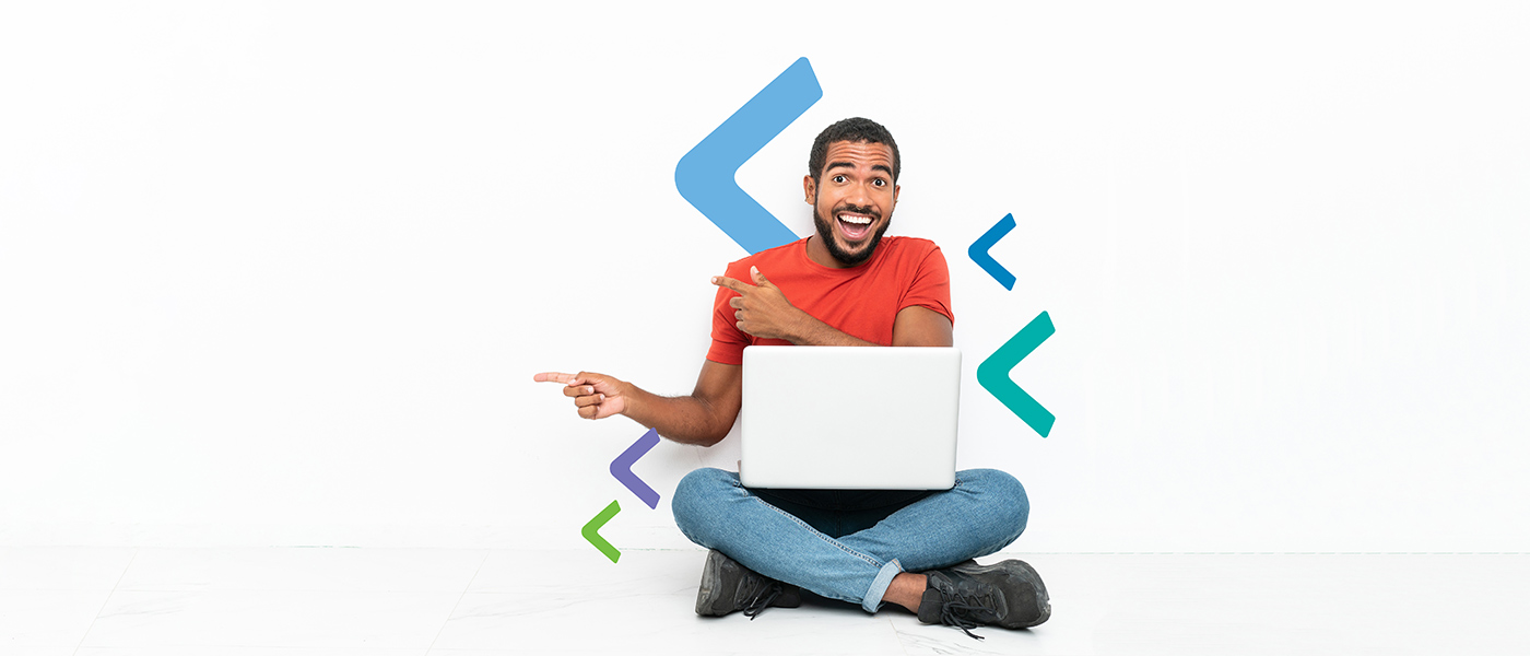 Man sitting on floor pointing