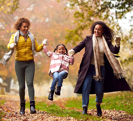 Family celebrating fall with Visa Balance Transfer offer