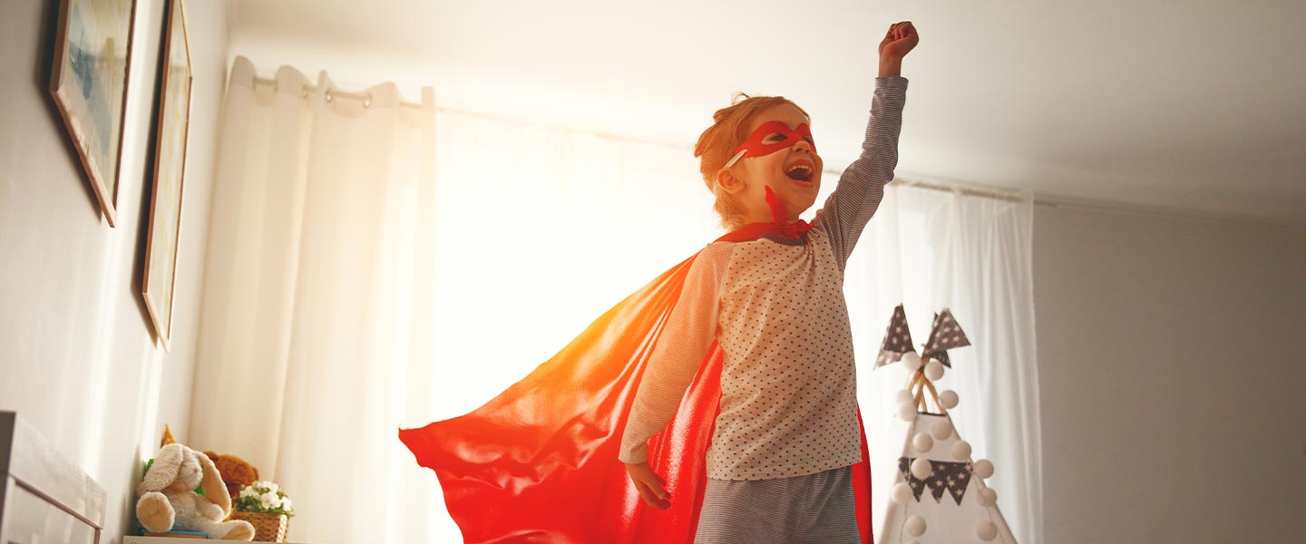 APGFCU Youth Savings Swoop into Saving little boy wearing a cape swooping