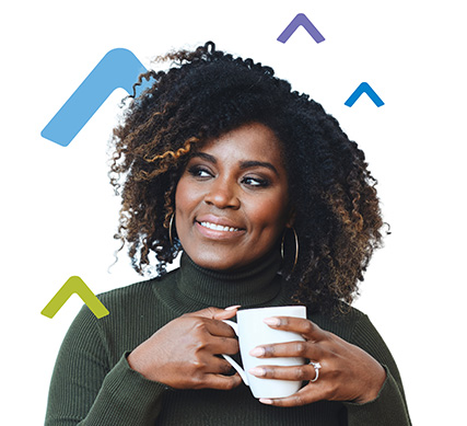 smiling woman holding a coffee cup