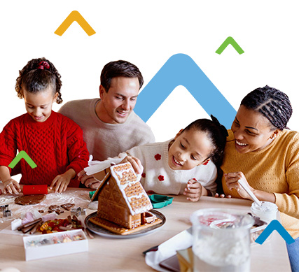 family building a cookie house