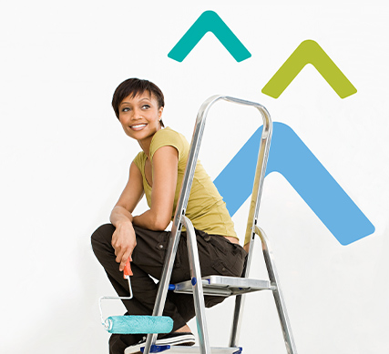 woman with paint roller